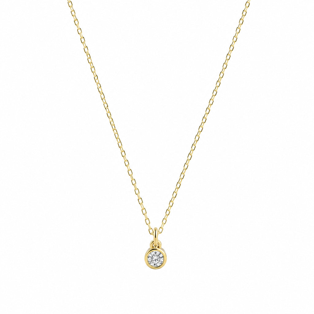14k Solid Gold necklace with a diamond pendant on a white background