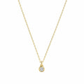 14k Solid Gold necklace with a diamond pendant on a white background