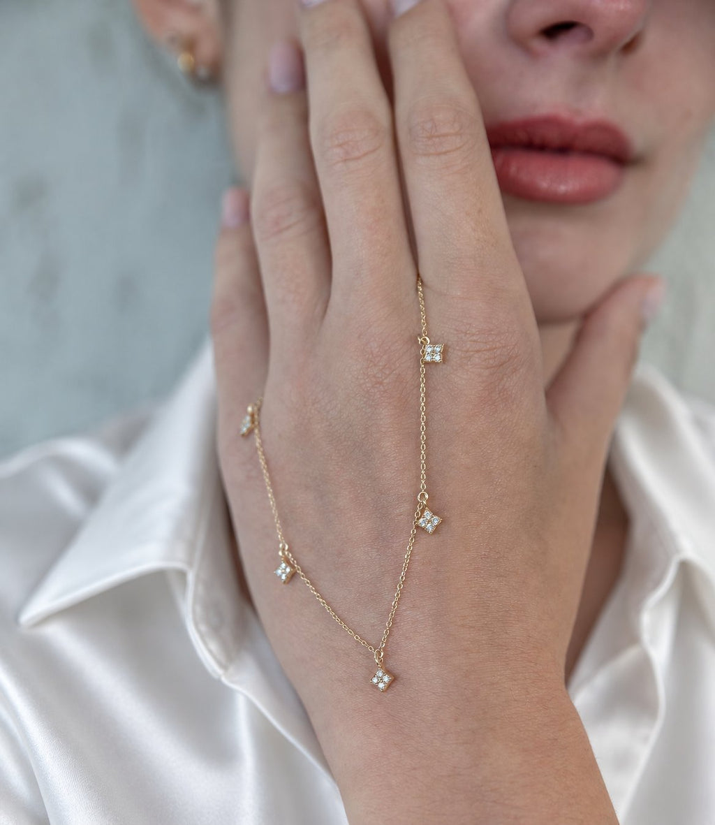 14K solid gold multi-clover lab-grown diamond necklace, model wearing white satin shirt