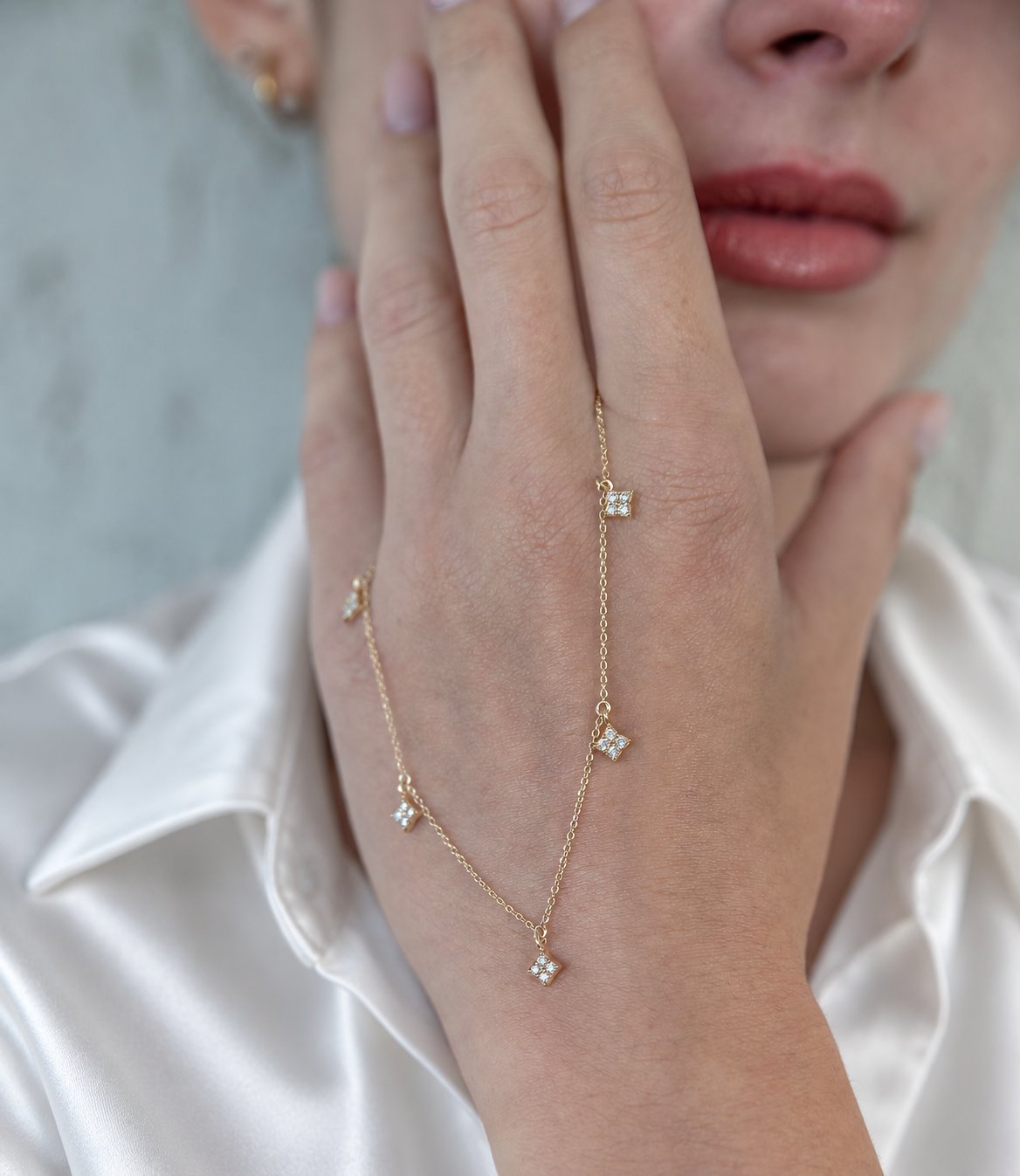 14K solid gold multi-clover lab-grown diamond necklace, model wearing white satin shirt