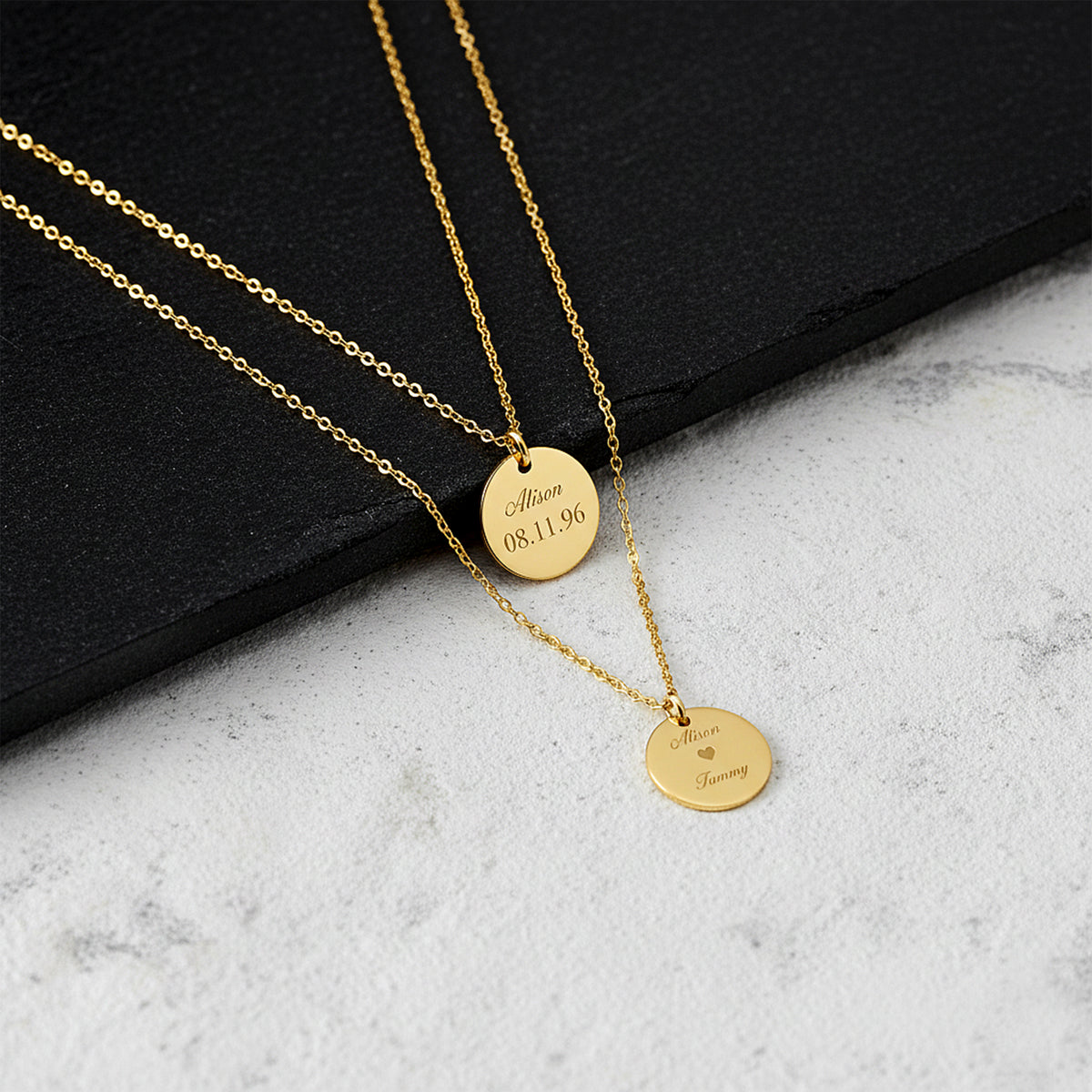 Close-up of 14K yellow gold disc necklace