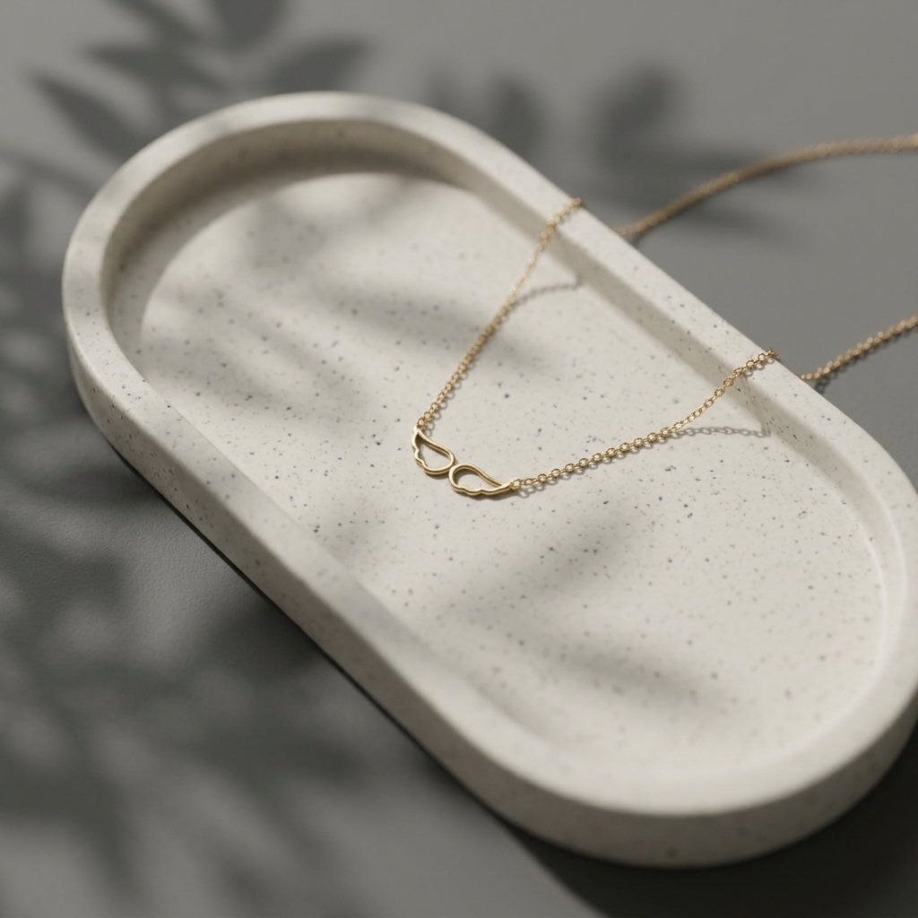 14K yellow gold angel wing memorial necklace, design detail