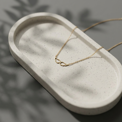 14K yellow gold angel wing memorial necklace, design detail