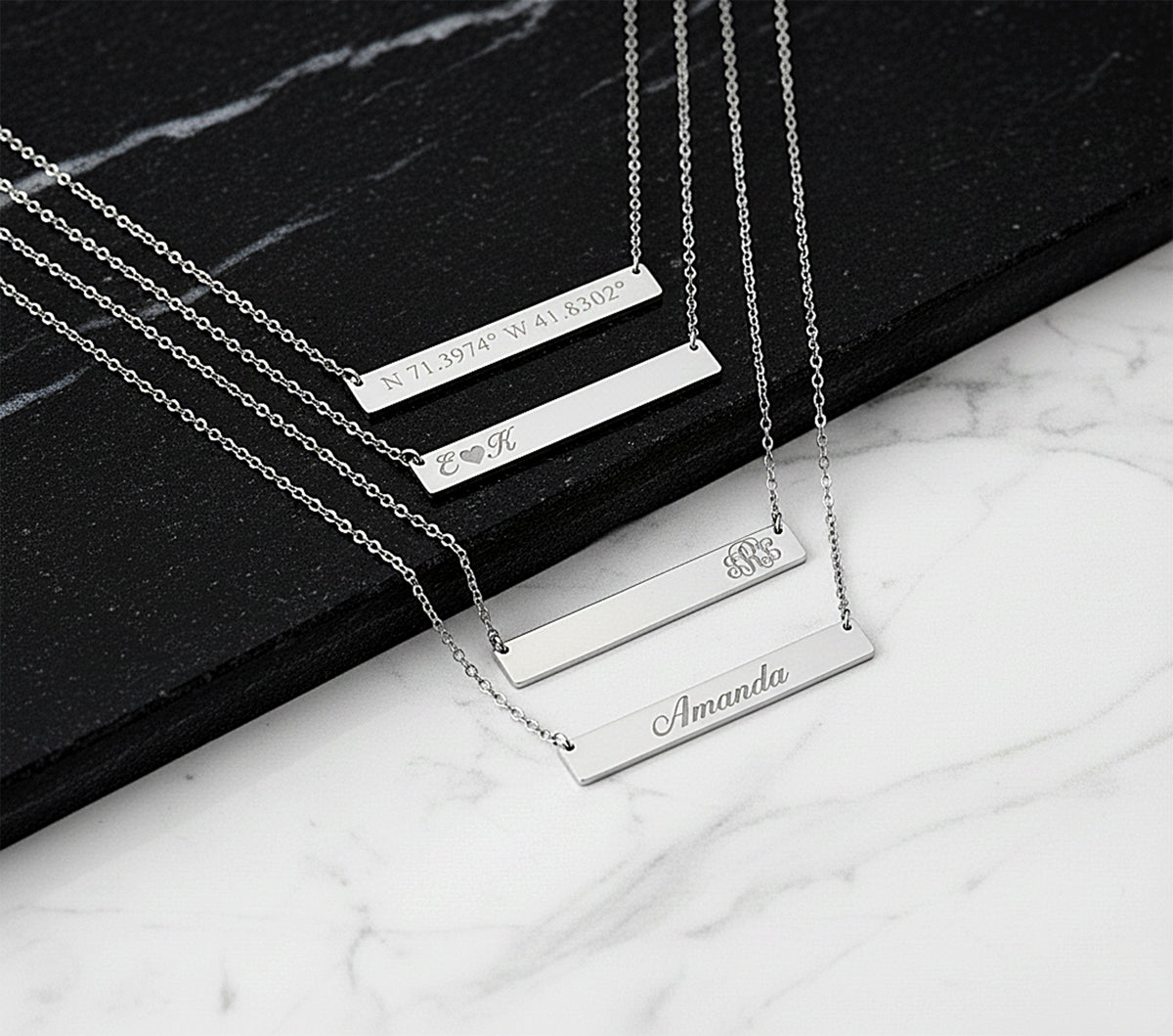 Close-up of 14K white gold bar necklace