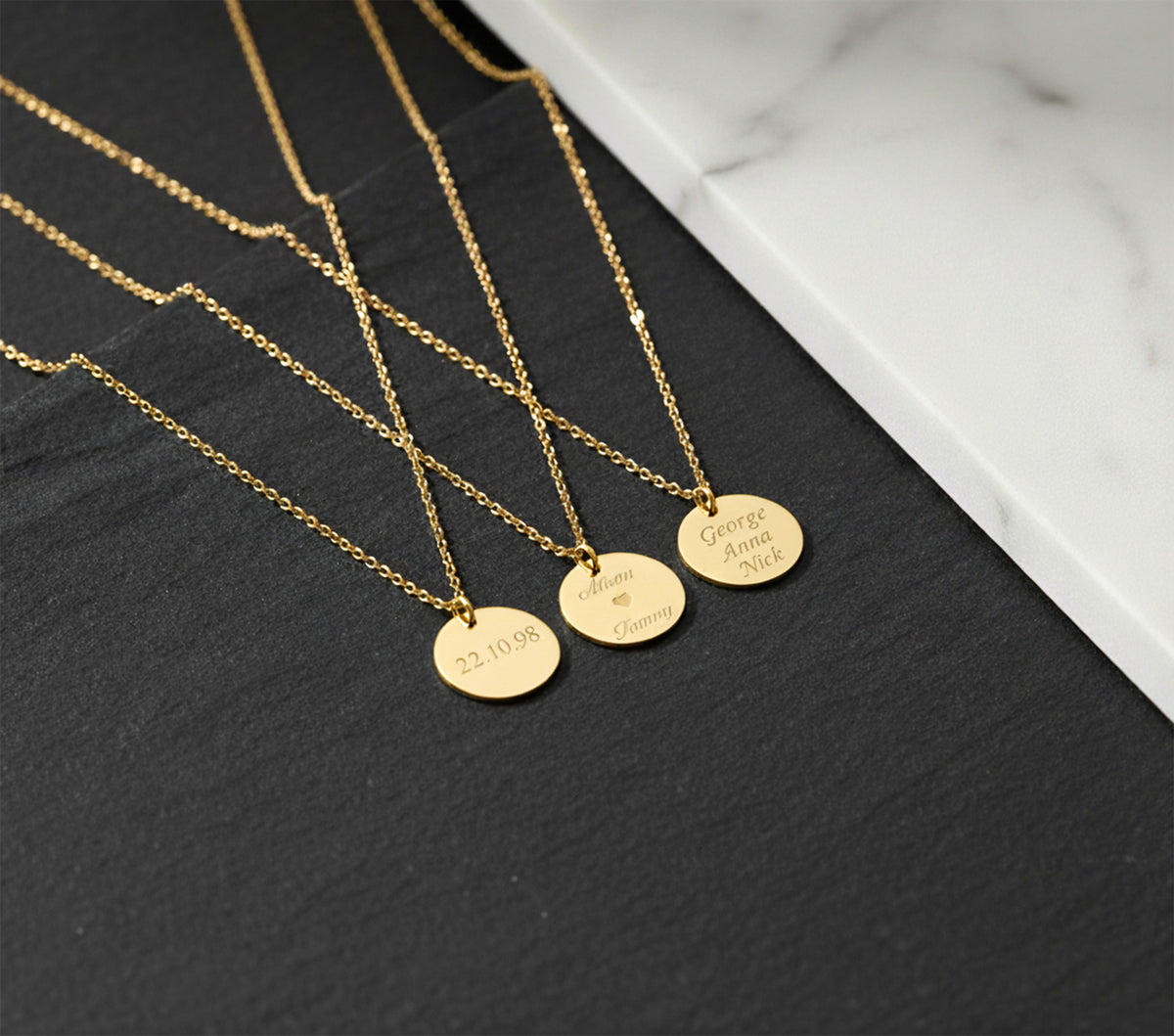 Close-up of 14K solid gold personalized disc necklace