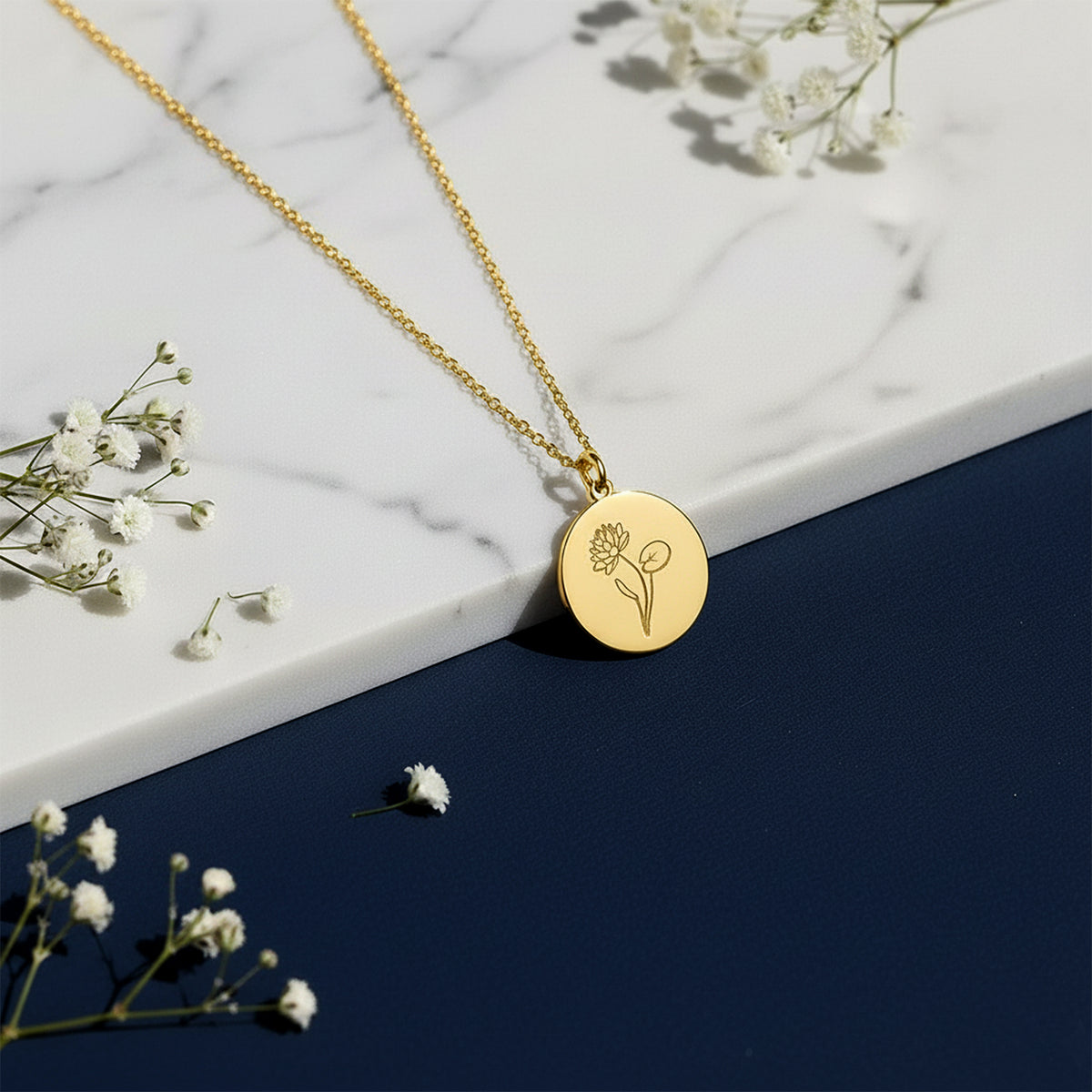 Close-up of 14K yellow gold personalized birth flower necklace