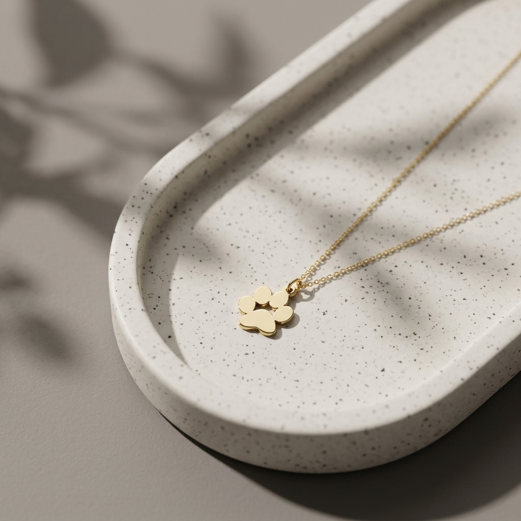 14K solid gold engraved paw print necklace, design detail