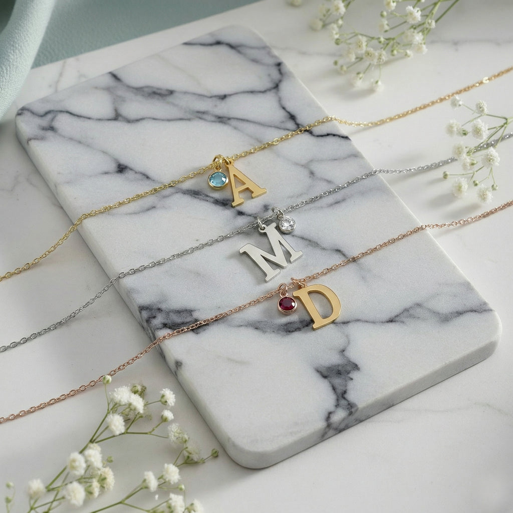 Personalized round initial necklace with colored birthstone charm options